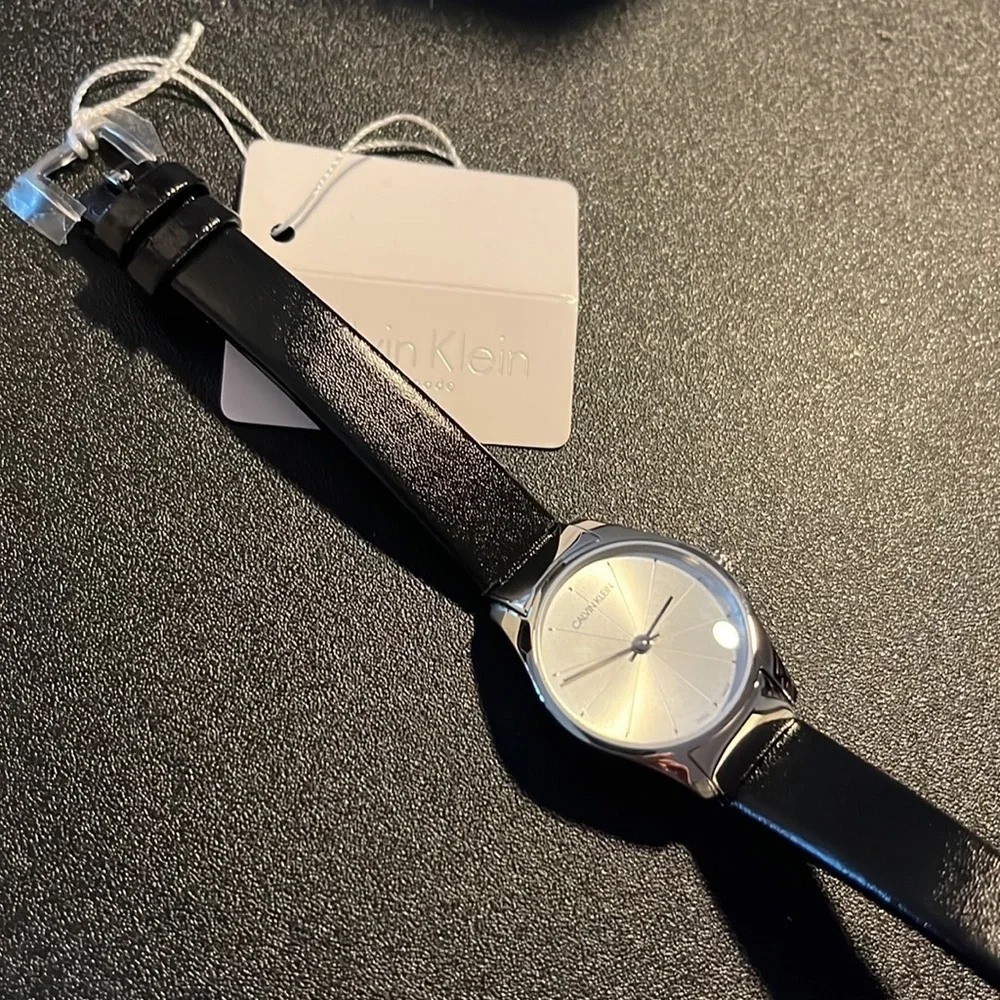 NWT Calvin Klein Swiss made women’s watch with black leather band